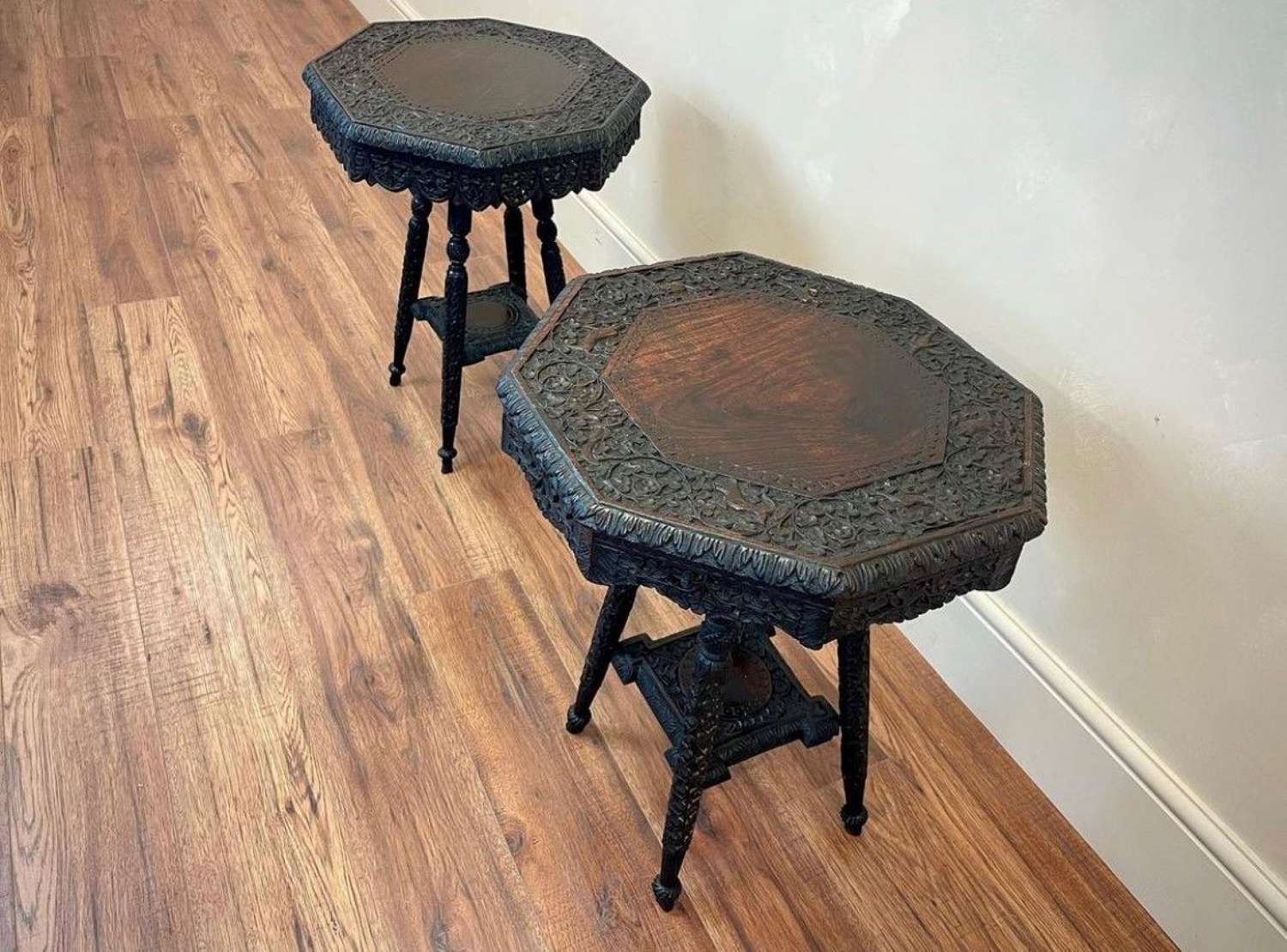 Pair of intricately carved Burmese side tables