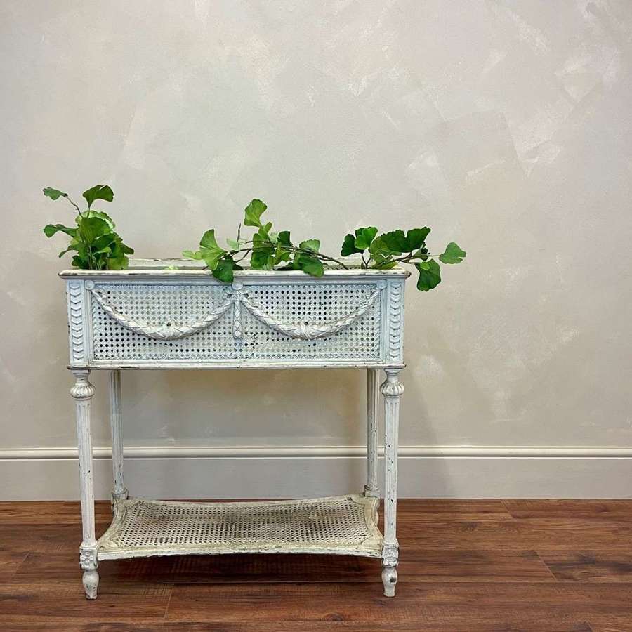 Painted wood and rattan plant stand