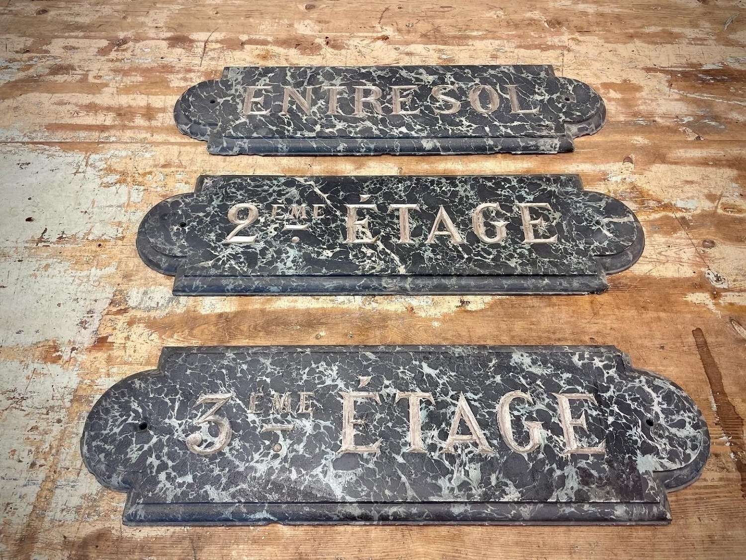 Simulated marble hotel signs