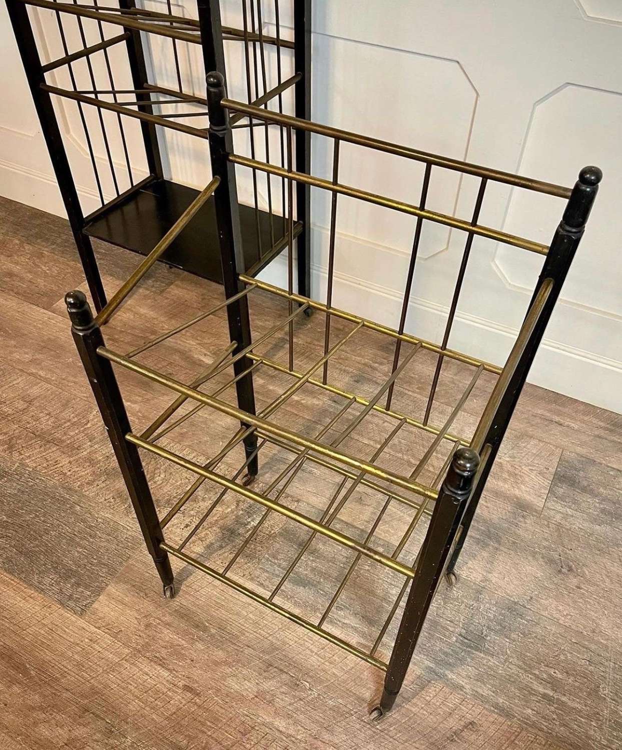 Brass and ebonised wood magazine rack/book stand