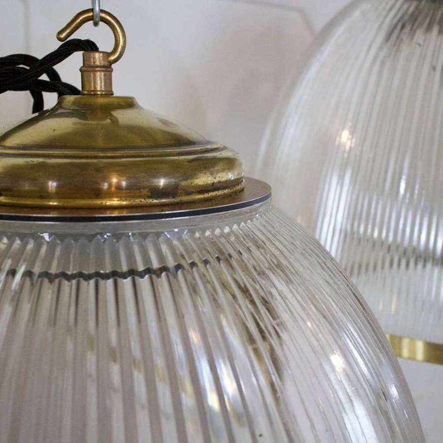 Glass holophane and brass pendant lights