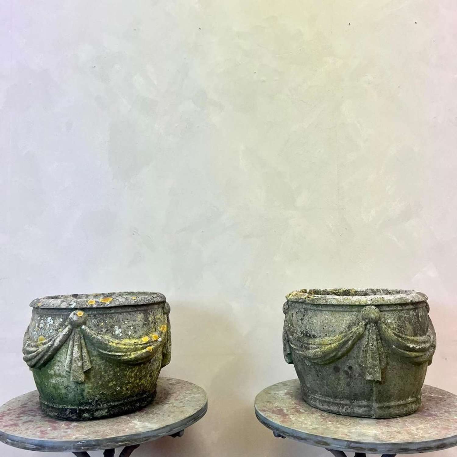 A Pair of Weathered Composite Stone Planters